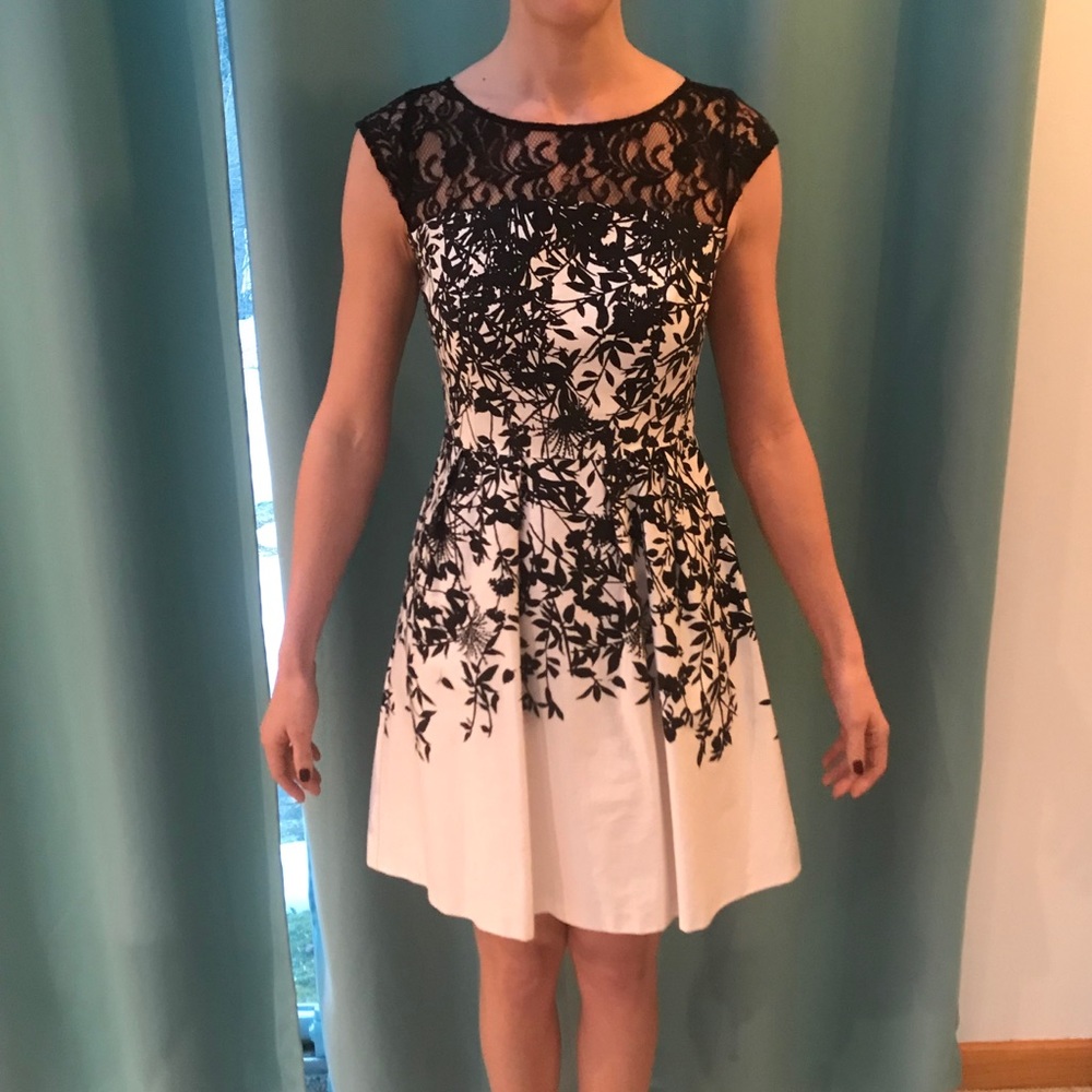 White dress with black flowers and lace top